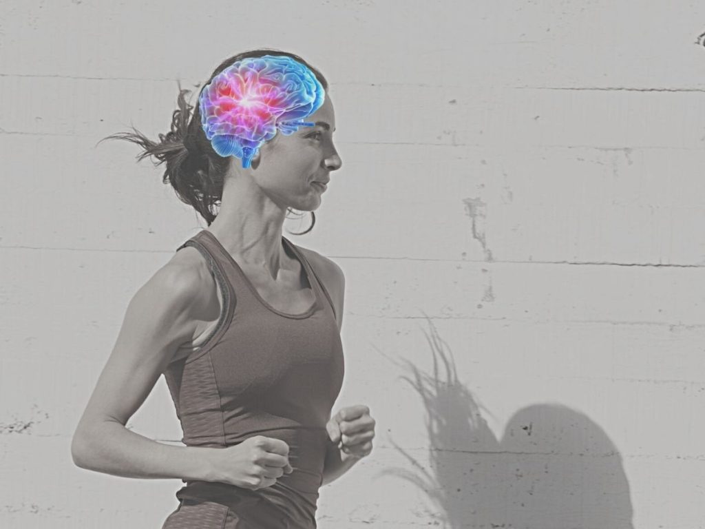 A runner with a visualization of a brain superimposed over her head, symbolizing the power of mental training