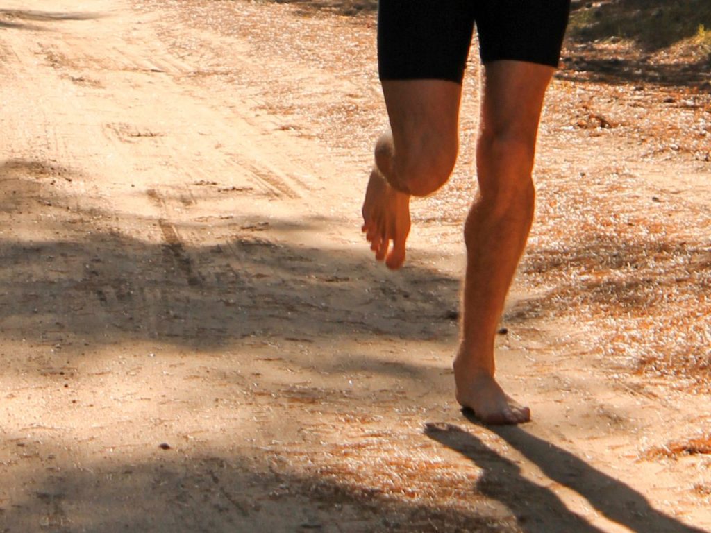 A barefoot trail runner