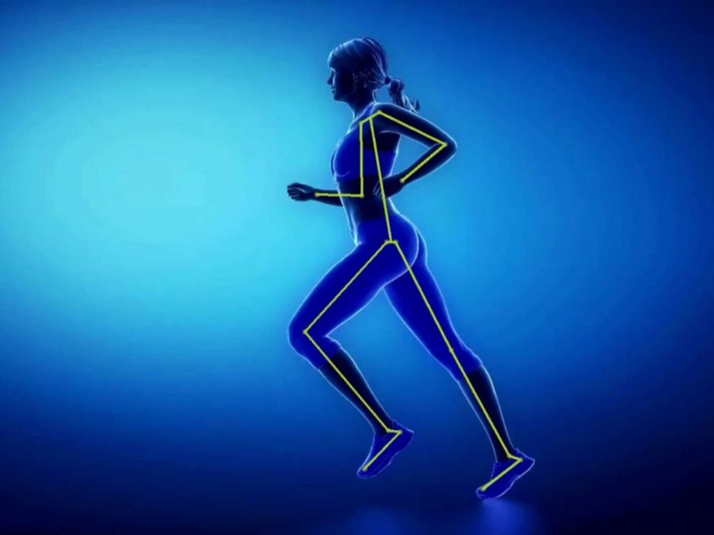 A runner with running form analysis graphics overlaid